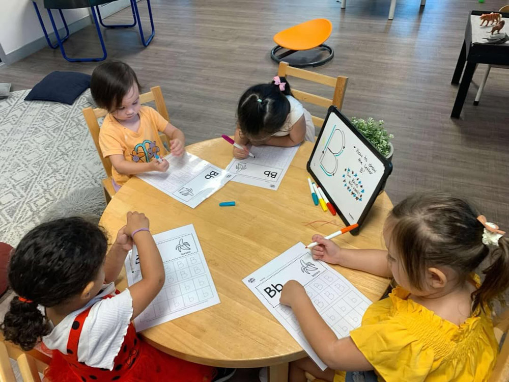 Kids Writing on Paper