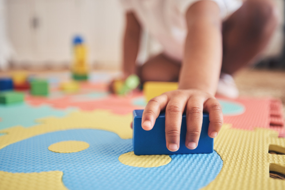 child playing with blocks